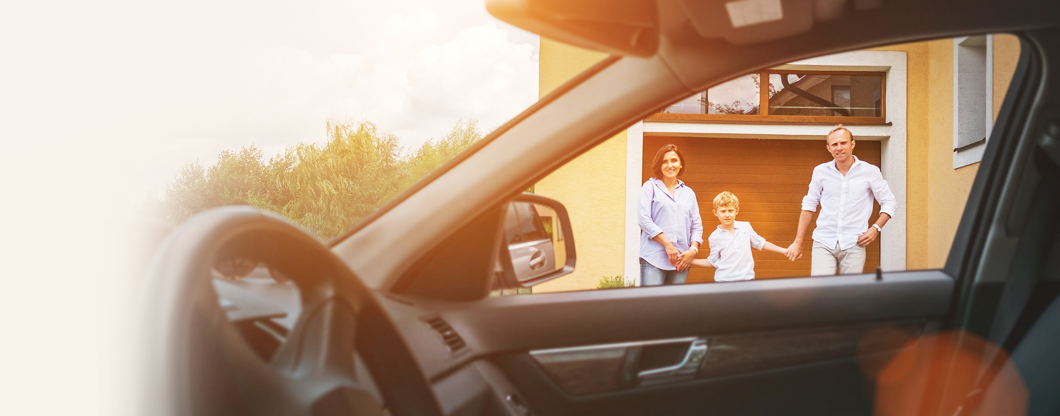 Young couple with little boy son goes to their car